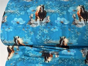 Bomuldsjersey - skønne heste og blomster på intens blå bund
